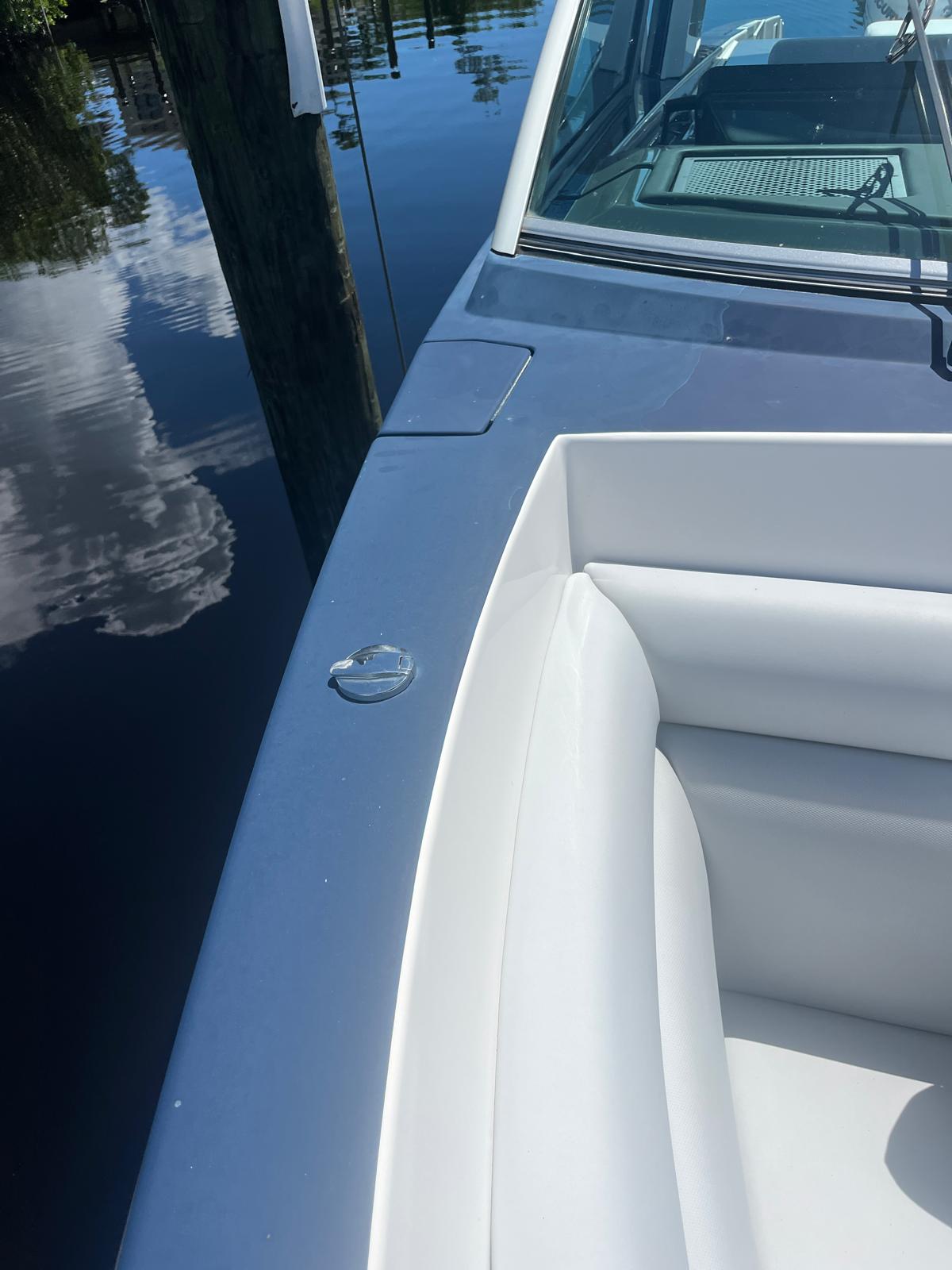 Before — dull gunwale and rail